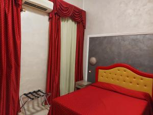 Ένα ή περισσότερα κρεβάτια σε δωμάτιο στο Hotel Antico Distretto