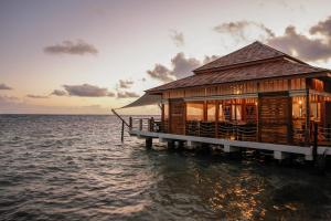 a house on a pier in the water at Decameron Los Delfines - All Inclusive in San Andrés