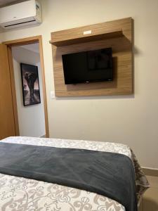 Ένα ή περισσότερα κρεβάτια σε δωμάτιο στο Flat Super Luxo - Rio Quente - Acesso Ao Rio +54 φωτογραφίες
