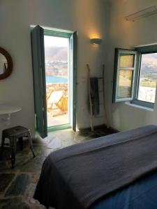 Krevet ili kreveti u jedinici u okviru objekta Amorgos Elegant Houses, Villa 3 +43 fotografije