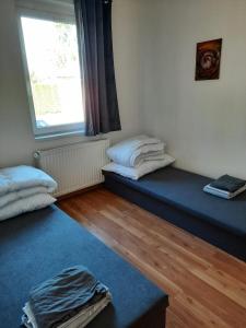 Katil atau katil-katil dalam bilik di Apartmány Skalice