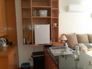 Kuchyň nebo kuchyňský kout v ubytování Karsen residence + 4 fotografie