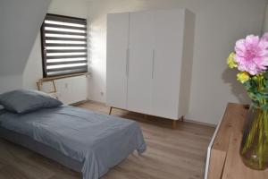 מיטה או מיטות בחדר ב-Pension,Ferien, Monteurwohnung , Unterkunft,Zimmer