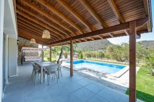 Bazén v ubytování Stone House Datça Blok-B nebo v jeho okolí