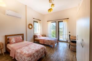 Postel nebo postele na pokoji v ubytování Stone House Datça Blok-B