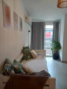 A bed or beds in a room at TEKOHA, Alquiler Temporario en Posadas!