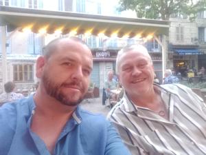 two men sitting next to each other at le vallon de bargemon in Bargemon