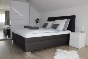 Postel nebo postele na pokoji v ubytování Apartmán 2023