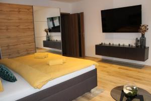 Postel nebo postele na pokoji v ubytování Apartmán 2023