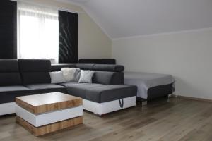 Posezení v ubytování Apartmán 2023