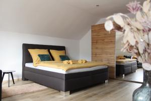 Katil atau katil-katil dalam bilik di Apartmán 2023