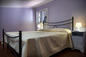 Postel nebo postele na pokoji v ubytování Villa Calliope Pool sea View