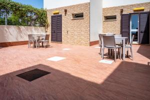 Patio nebo venkovní prostory v ubytování Villa Calliope Pool sea View