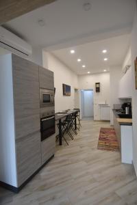 A kitchen or kitchenette at Casa Romeo