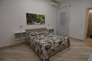 A bed or beds in a room at Casa Romeo