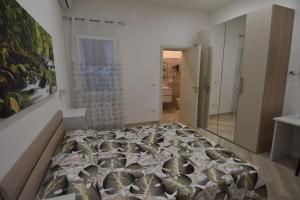 A bed or beds in a room at Casa Romeo