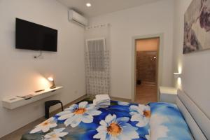 A bed or beds in a room at Casa Romeo