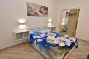 A bed or beds in a room at Casa Romeo