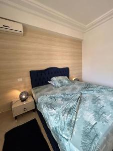 Katil atau katil-katil dalam bilik di cosy et spacieux, avec balcon