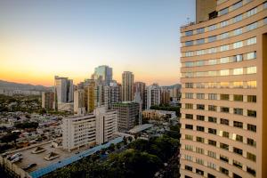 a view of a city skyline with a tall building at Radisson Alphaville in Barueri