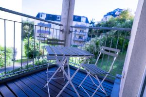En balkon eller terrasse på Design Apartment - Balkon - Induktionskochfeld - Zentral