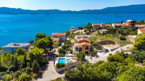 an aerial view of a small town with the water at Vila Bonita in Klek