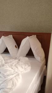 Uma cama ou camas num quarto em Amarula Tree Hotel