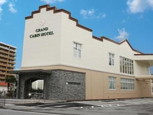 un edificio con un letrero que lee hotel Grand Canyon en Grand Cabin Hotel Naha Oroku - Vacation STAY 46864v en Naha