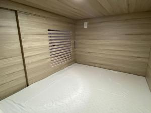 Säng eller sängar i ett rum på Capsulas La Sin Ventura