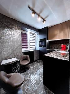 Ένα μπάνιο στο Black Pearl Luxury Apartment