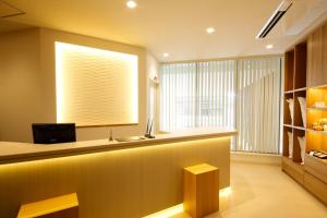 a kitchen with a counter with a window and a sink at Hotel Hanakomichi - Vacation STAY 27580v in Nara