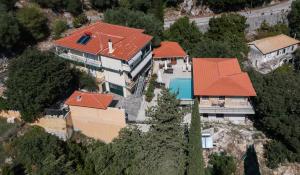 an overhead view of a house with an orange roof at Secret Paradise in Kariá