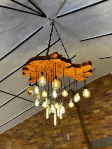a chandelier is hanging from a ceiling at Glamping Shalom in Choachí
