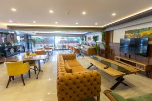 Loungen eller baren på Asia Business Suites