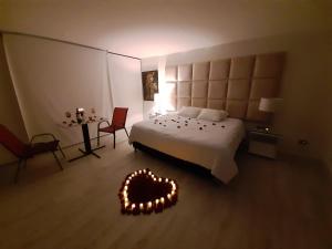 Postel nebo postele na pokoji v ubytování Mirador samsara Suite Luxury piso completo