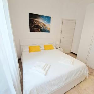 Llit o llits en una habitació de AmaTi Milano