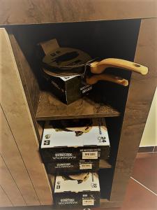 a stack of boxes with a phone on top at Marco&Chiara Treviso in Treviso