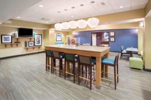 a conference room with a large table and chairs at Hampton Inn Santa Rosa in Santa Rosa