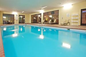 a large pool with blue water in a hotel room at Holiday Inn Express Hotel & Suites Franklin, an IHG Hotel in Franklin