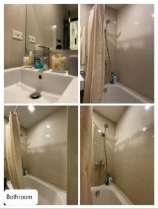 a bathroom with a tub and a sink and a shower at The Beach Suite at The Mactan Newtown in Lapu Lapu City