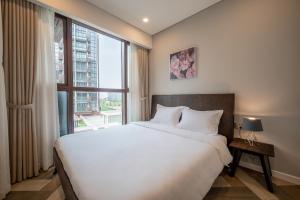 Mynd úr myndasafni af Metropole Condo City Central Sy's Home í Ho Chi Minh +37 myndir