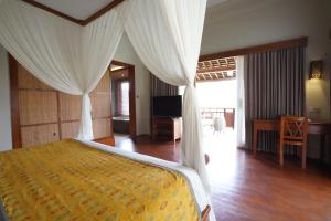 Vuode tai vuoteita majoituspaikassa Kenran Resort Ubud By Soscomma