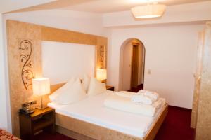 Posteľ alebo postele v izbe v ubytovaní Hotel Albona