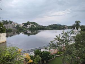 a view of a large body of water at Shree Krishna Hotel in Udaipur