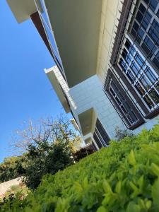 a building with a staircase in front of a building at Quinta Doña Carlota in Chiconcuac