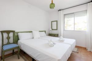 Katil atau katil-katil dalam bilik di Stay U-nique Apartment Goya