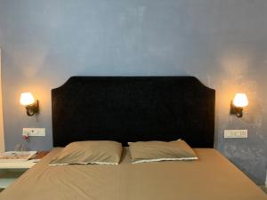 Postel nebo postele na pokoji v ubytování Green Serene Abode