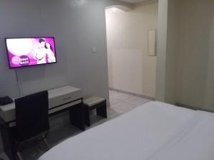 Μια τηλεόραση ή/και κέντρο ψυχαγωγίας στο MITOS LUXURY SUITES -Somosu