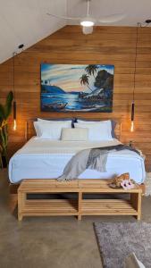 Postel nebo postele na pokoji v ubytování Bombua Beach House