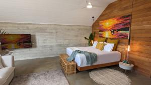 Postel nebo postele na pokoji v ubytování Bombua Beach House + 34 fotografií